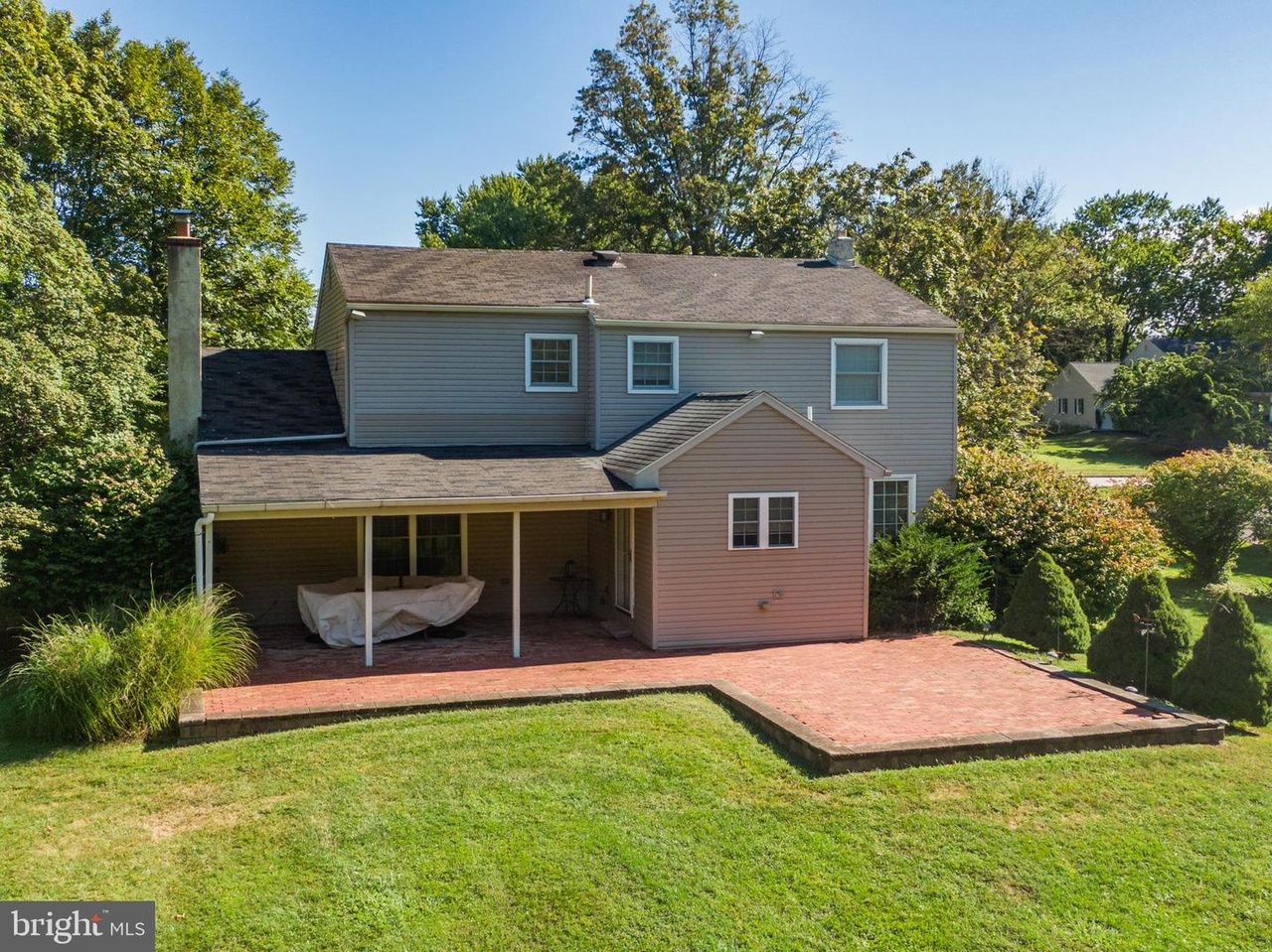 Rear exterior and covered patio at 1040 Hunter Hill Drive