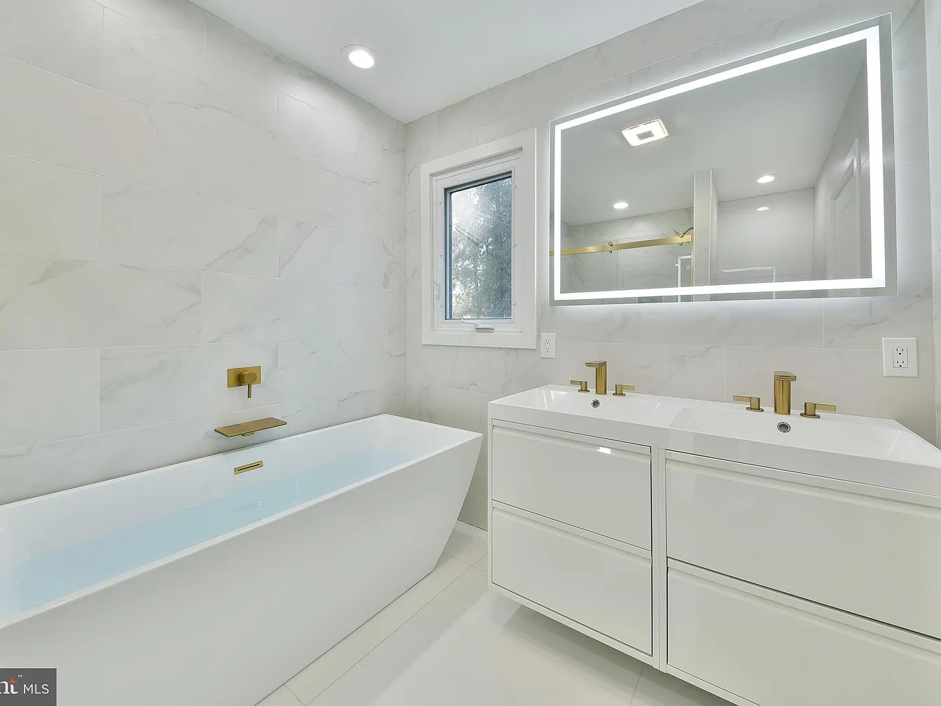 Renovated primary bathroom at 620 Meadow Road