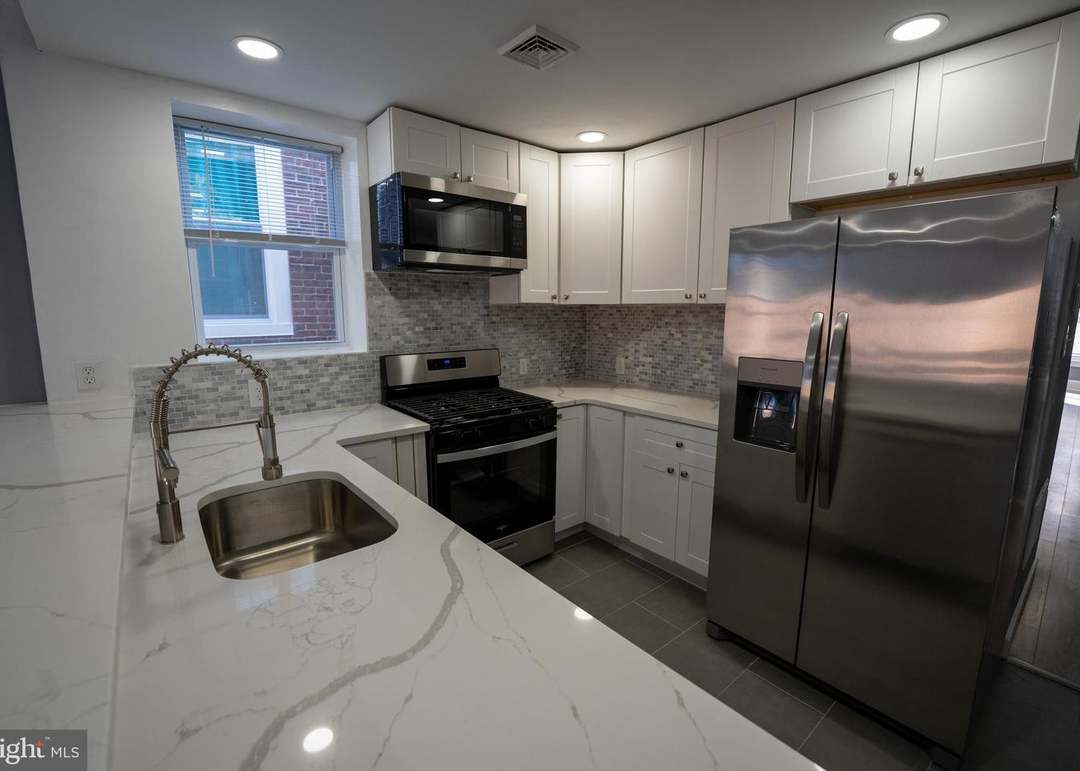 Finished kitchen with quartz counters at 55 West Sharpnack Street